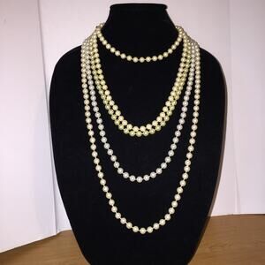 5 Strands of varying lengths of faux Pearls Vintage